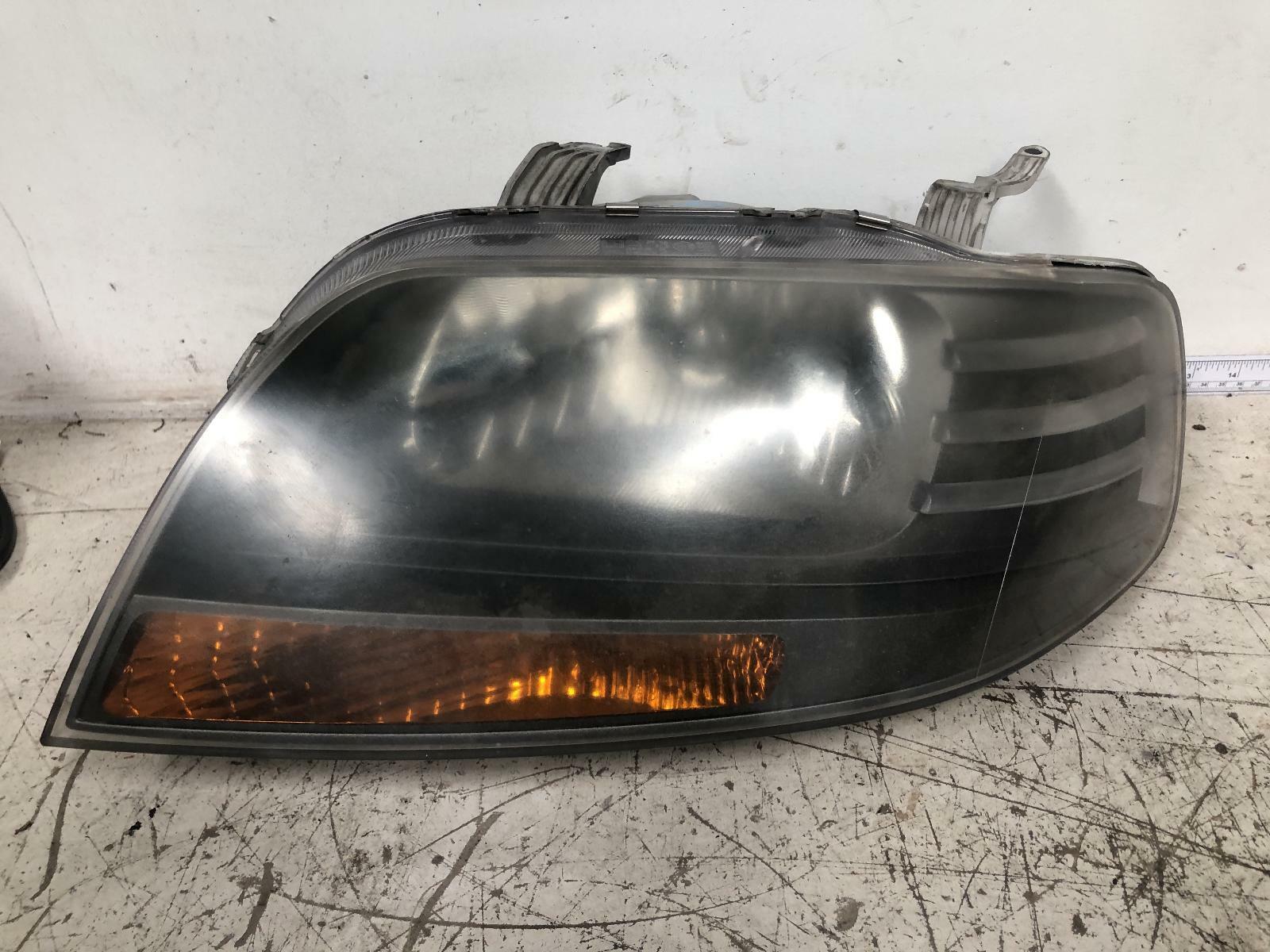 holden barina headlight