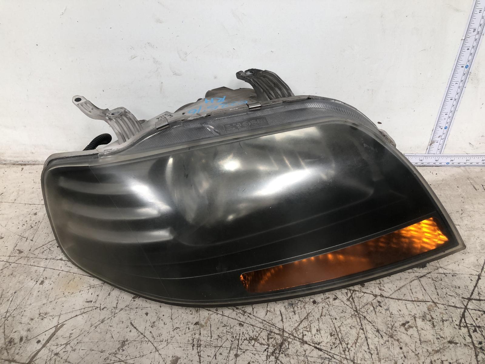 holden barina headlight