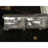 Nissan Nomad Van Right Headlight White Base Koito PH52439 12/86-09/92