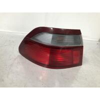 Mazda 626 GF Left Tail Light 08/1997-11/1999