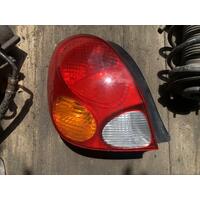 Toyota Corolla Left Tail Light AE112 10/99-11/01 SECA