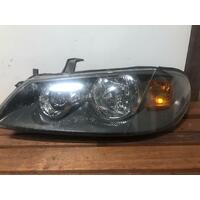 Nissan PULSAR Left Head Light N16 Hatch 06/01-12/05