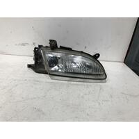 Mazda 323 Right Headlight BA11 KOITO 11/96-08/98