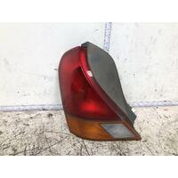 Ford LASER Left Taillight KN Hatch 02/99-04/01