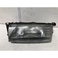 Ford LASER Left Headlight KF 04/90-09/91