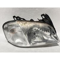 Mazda TRIBUTE Right Headlight YU SERIES 02/01-11/03