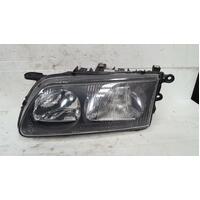 Mazda 626 Left Head Light GF Black Insert 01/1992-08/1997