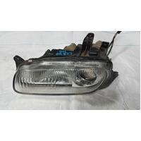 Mazda 323 Right Head Light 11/96-08/98