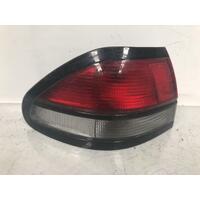 Mazda 626 Left Tail Light GF 08/1997-11/1999