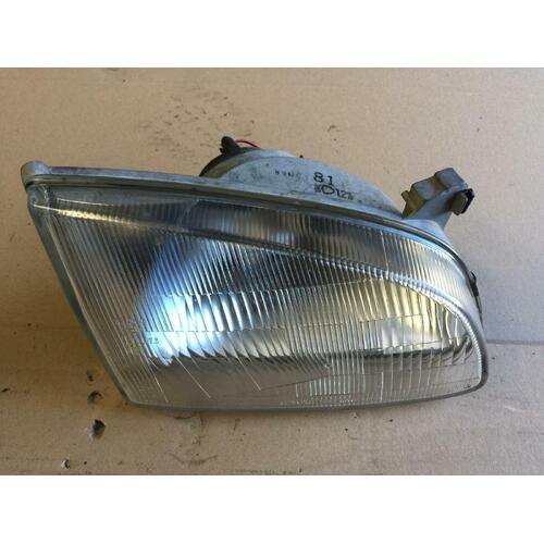 Toyota Starlet Right Headlamp EP91, KOITO LENS# 10-79, 03/96-09/99 