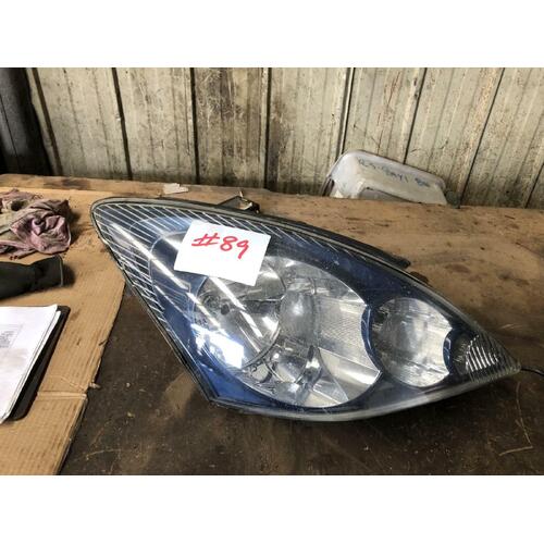 Mitsubishi Magna TL-TW Sedan Right Head Lamp Blue Backing 10/2004-08/2005