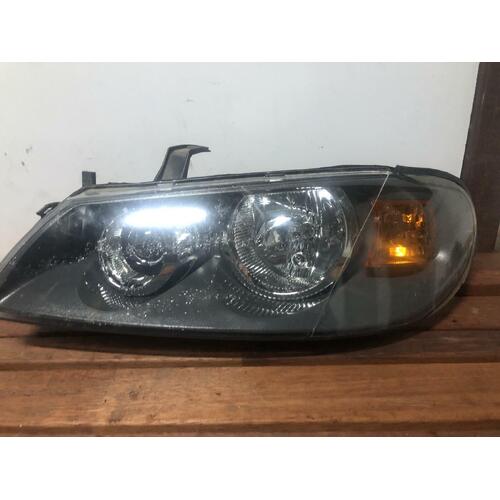 Nissan PULSAR Left Head Light N16 Hatch 06/01-12/05