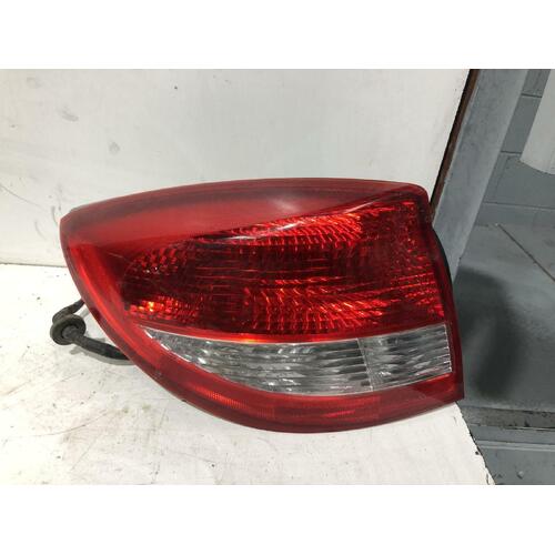 Kia RIO Left Tail Light DC Sedan 09/02-07/05