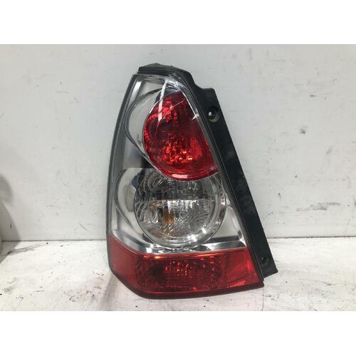 Subaru FORESTER Left Tail Light 2.5X 06/05-02/08 Chrome Insert