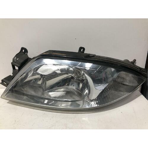 Ford FALCON Left Head Light AU2 Sedan/ Wagon 03/00-10/01