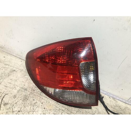 Kia RIO Left Tail Light DC Hatch 09/02-07/05