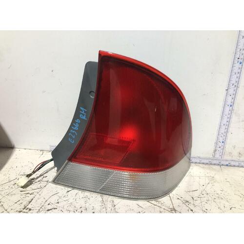 Ford LASER Right Taillight KN Sedan 02/99-04/01