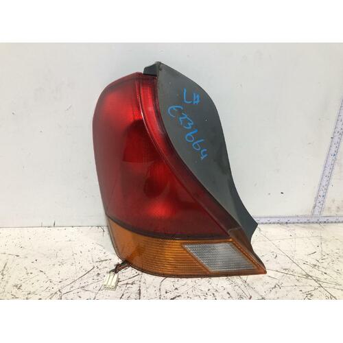 Ford LASER Left Taillight KN Hatch 02/99-04/01