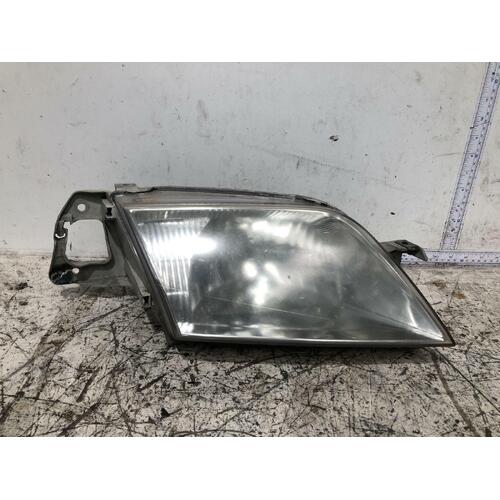 Ford LASER Right Headlight KN/KQ Sedan/ Hatch 02/99-09/02