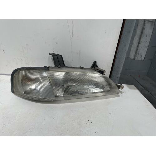 Ford Laser Right Head Light KJ III 12/1996-12/1998