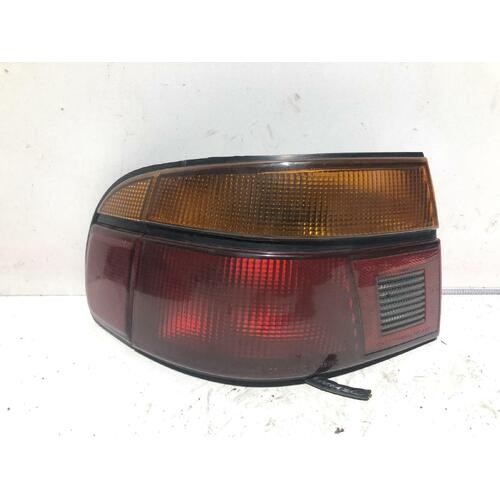 Ford LASER Left Taillight KF-KH 04/90-03/94