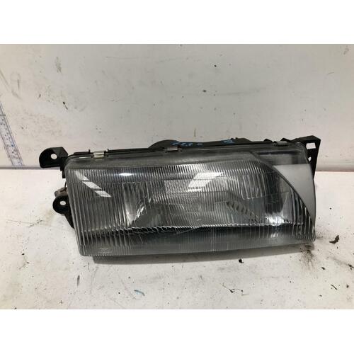 Ford LASER Right Headlight KF 04/90-09/91