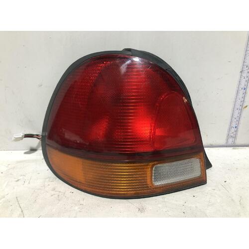 Ford LASER Left Taillight KJ-KL Hatch 5DR 10/94-12/98