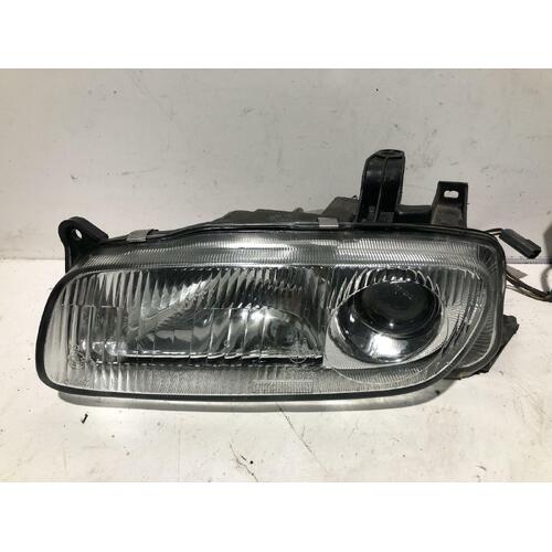 Mazda 323 Left Headlight BA11 11/96-08/98 KOITO