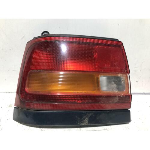 Toyota COROLLA Left Taillight AE101 Hatch 06/96-10/99