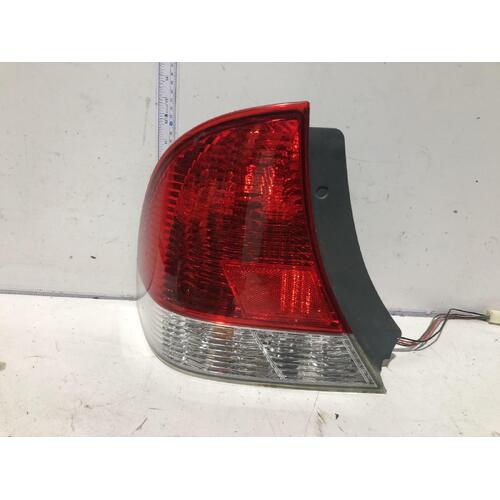 Ford LASER Left Taillight KQ Sedan 04/01-09/02