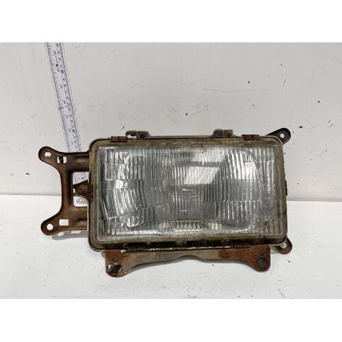 Toyota Corona Left Headlight RT132 10/79-07/83