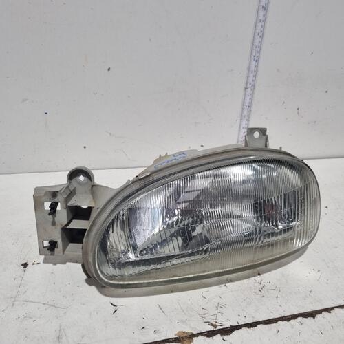 Madza 121 Left Headlight DB 12/90-12/97