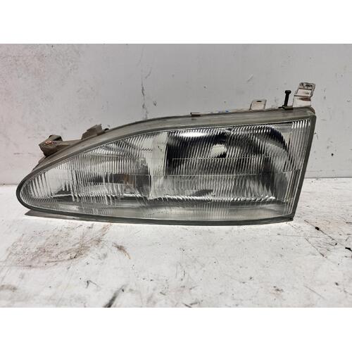 Holden APOLLO Left Headlight JM-JP Glass 09/93-12/97