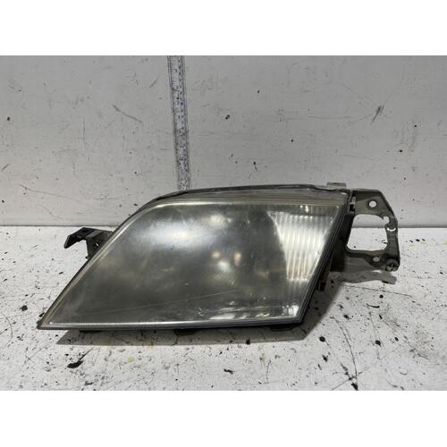 Ford LASER Left Headlight KN Sedan 02/99-09/02 