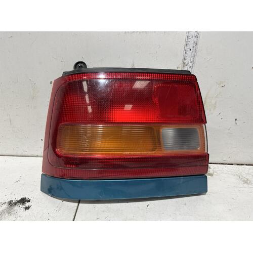 Toyota COROLLA Left Taillight AE101 Hatch 06/96-10/99 